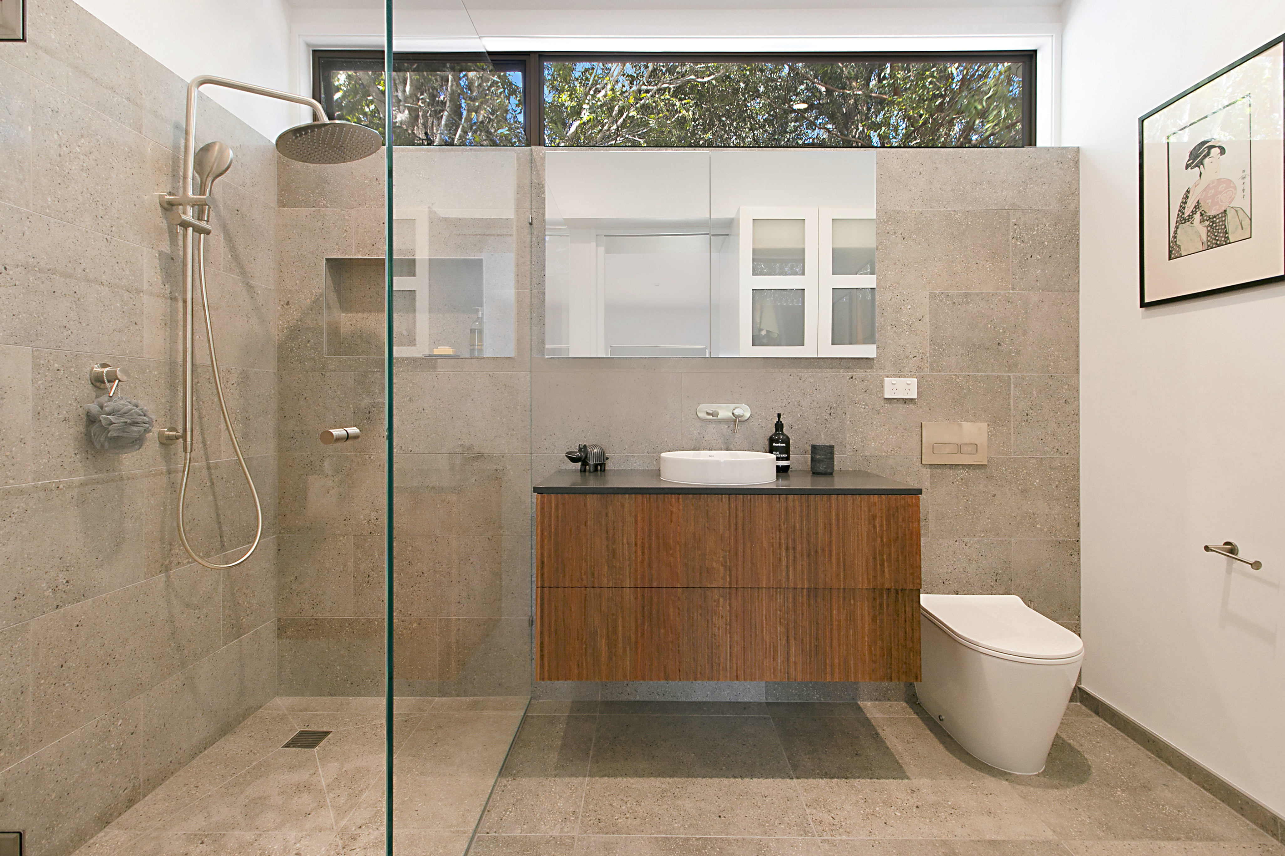 Stone-tiled studio ensuite