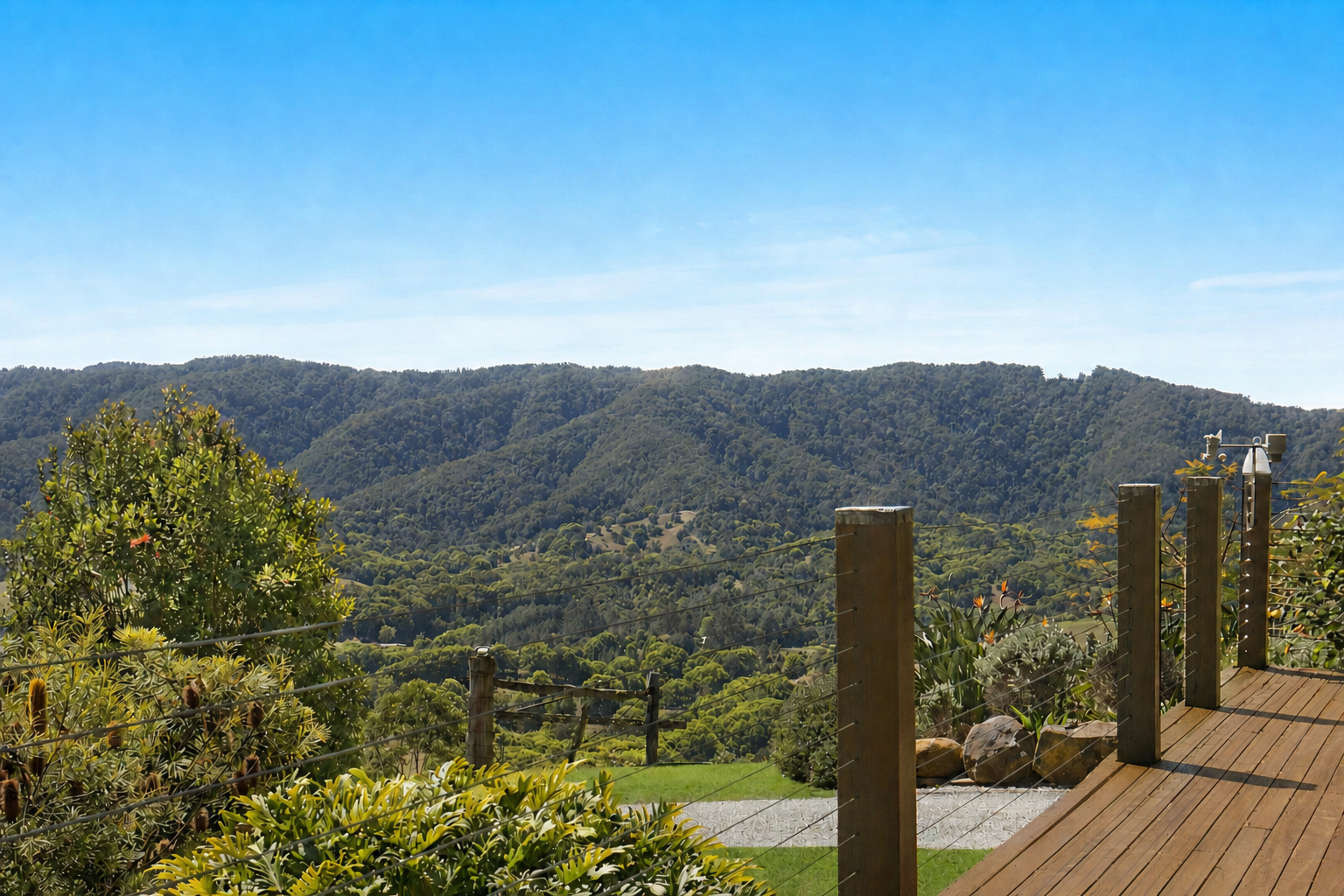 The outlook across pasture and ridgeline