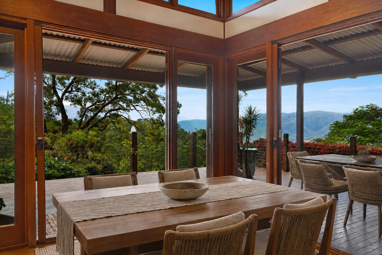 Open-plan living and dining beneath the timber pavilion